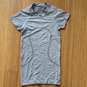 lululemon athletica white and navy striped women’s short sleeve top